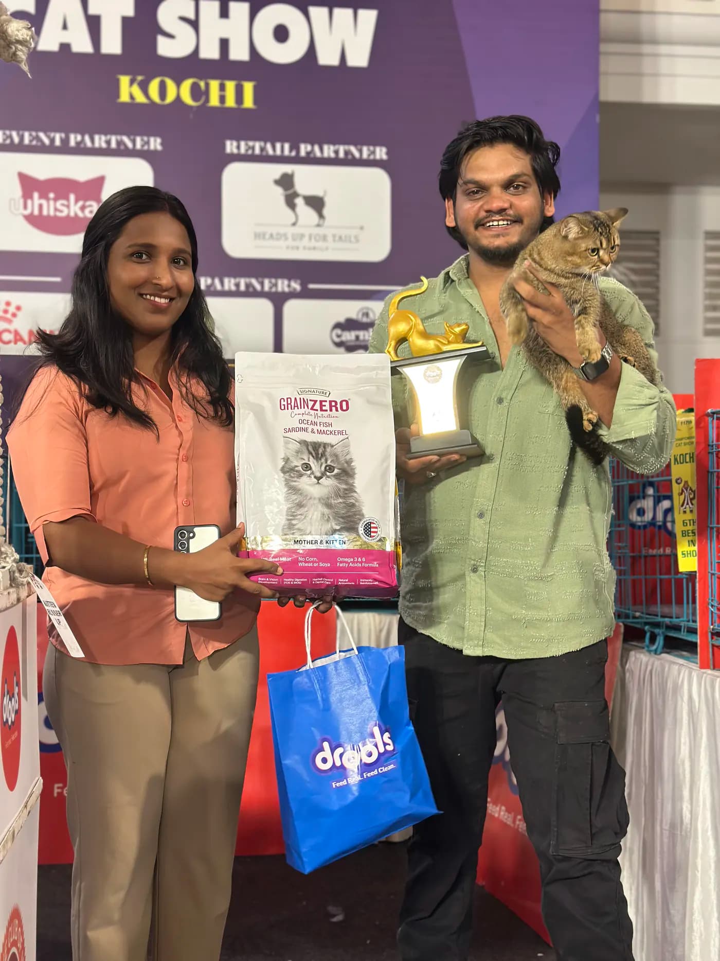 Third award ceremony scene during a championship feline competition